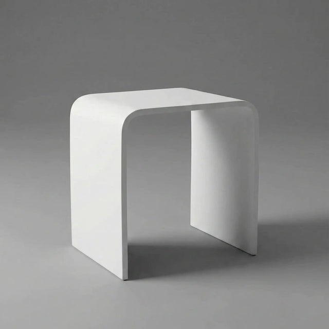 White stool on a gray background