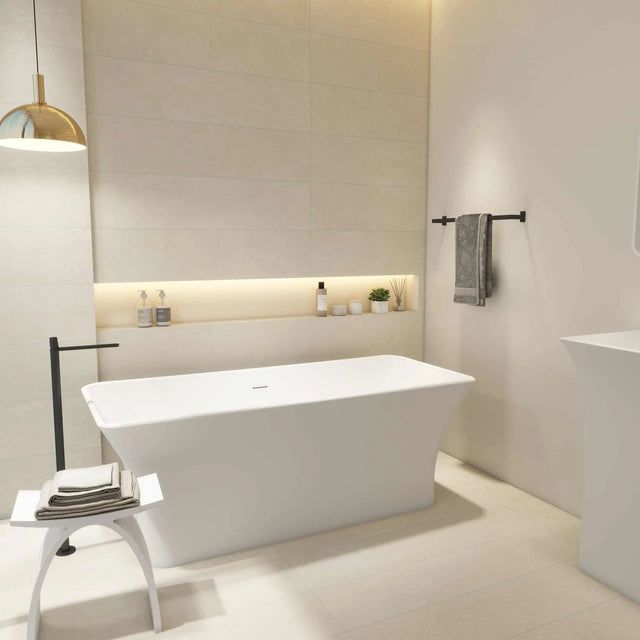 Freestanding Ragusa 165 bathtubs in INFINITE solid surfaces with built-in overflow and pop-up drainage