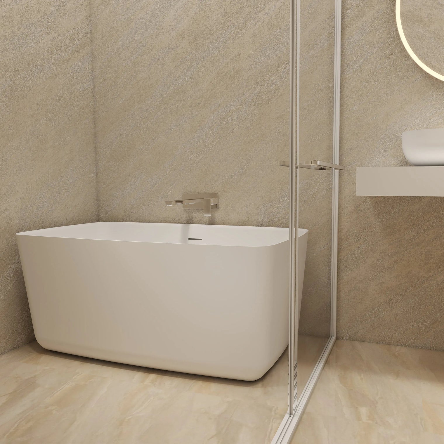 Modern bathroom with a freestanding bathtub and glass shower enclosure.