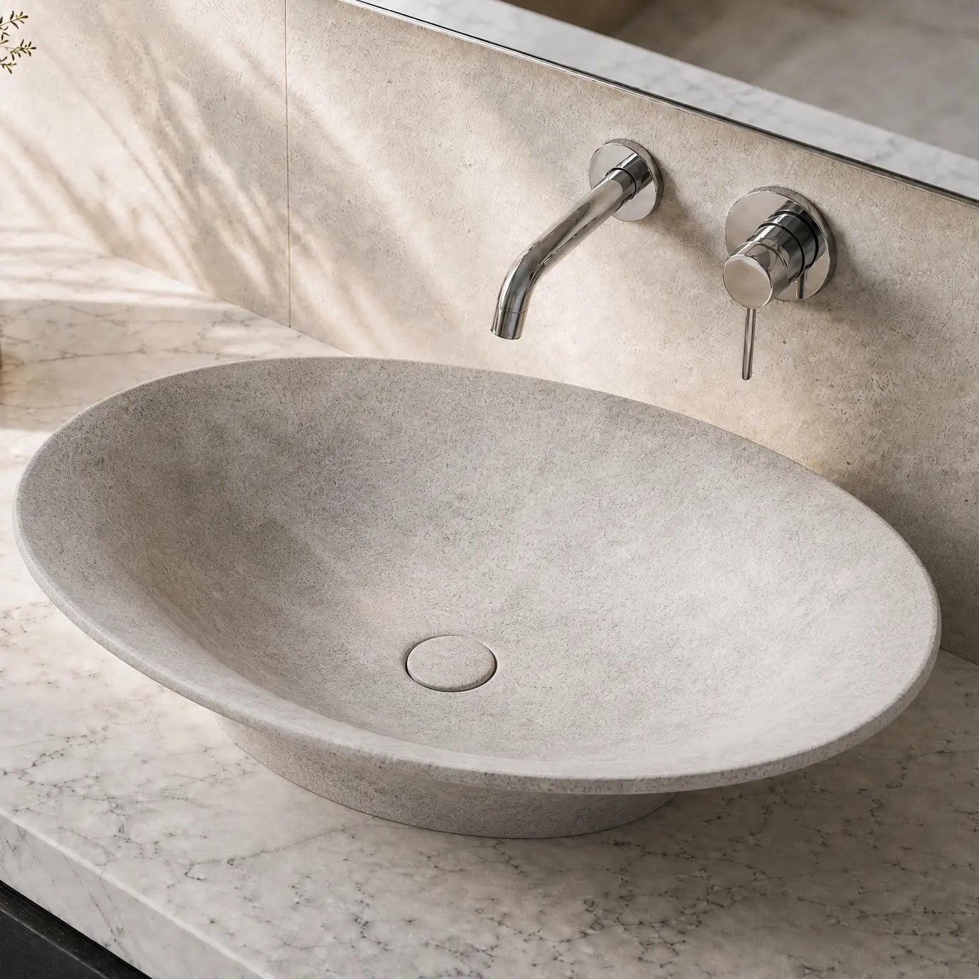 Bathroom vanity with a stone Concrete sink and modern faucet.