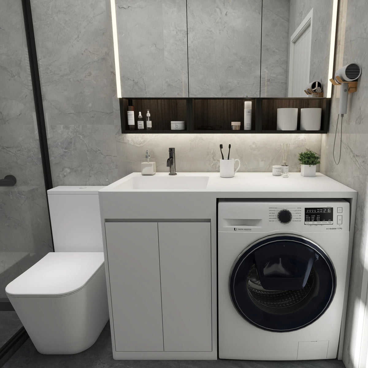 Modern bathroom with washing machine, sink, and toilet