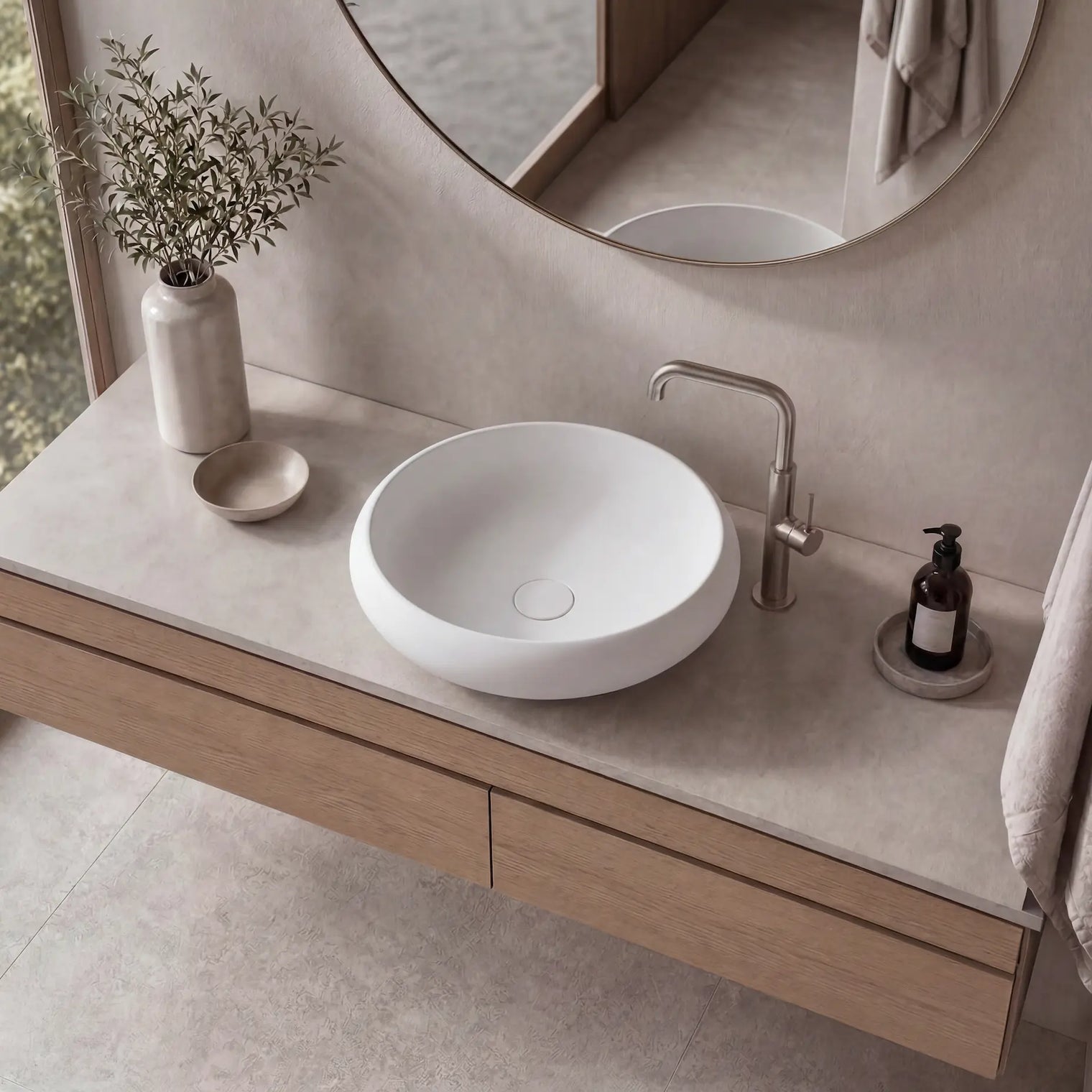 Bathroom vanity with a white sink, wooden cabinet, and decorative elements.
