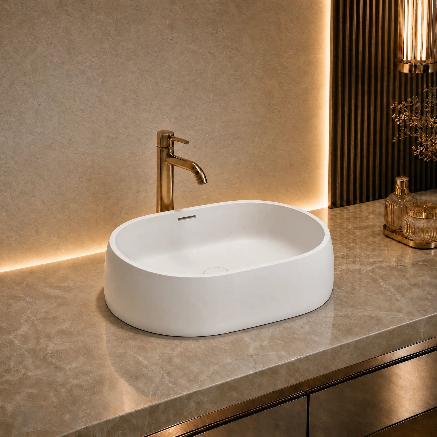 Modern bathroom solid surfaces sink with gold faucet on a marble countertop
