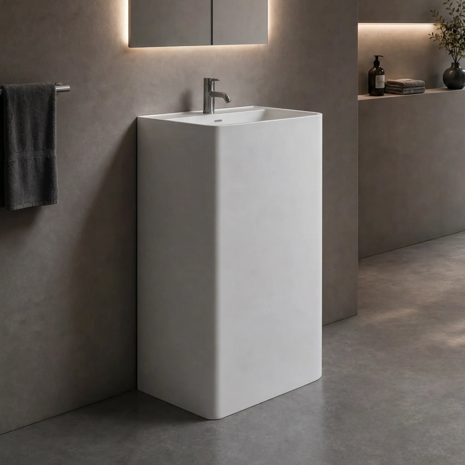 Modern bathroom with a freestanding sink and bathtub.