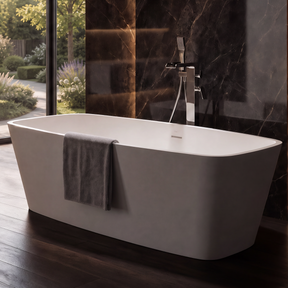 A modern freestanding bathtub in a luxurious bathroom with dark marble walls, wood flooring, and a large window overlooking a garden.