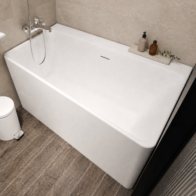A modern freestanding white bathtub in a minimalist bathroom setting with beige textured walls, dark wood-look flooring, floating white shelves, and a white toilet visible in the corner.