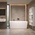 A modern bathroom interior featuring a freestanding white bathtub centered against a textured gray stone wall with warm LED lighting, alongside a floating white sink, mirror, toilet, and open shelving.