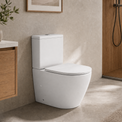 A modern white 2-piece wall-mounted toilet shown in a real bathroom setting with beige walls, wood cabinetry, a shower area, and a rug.