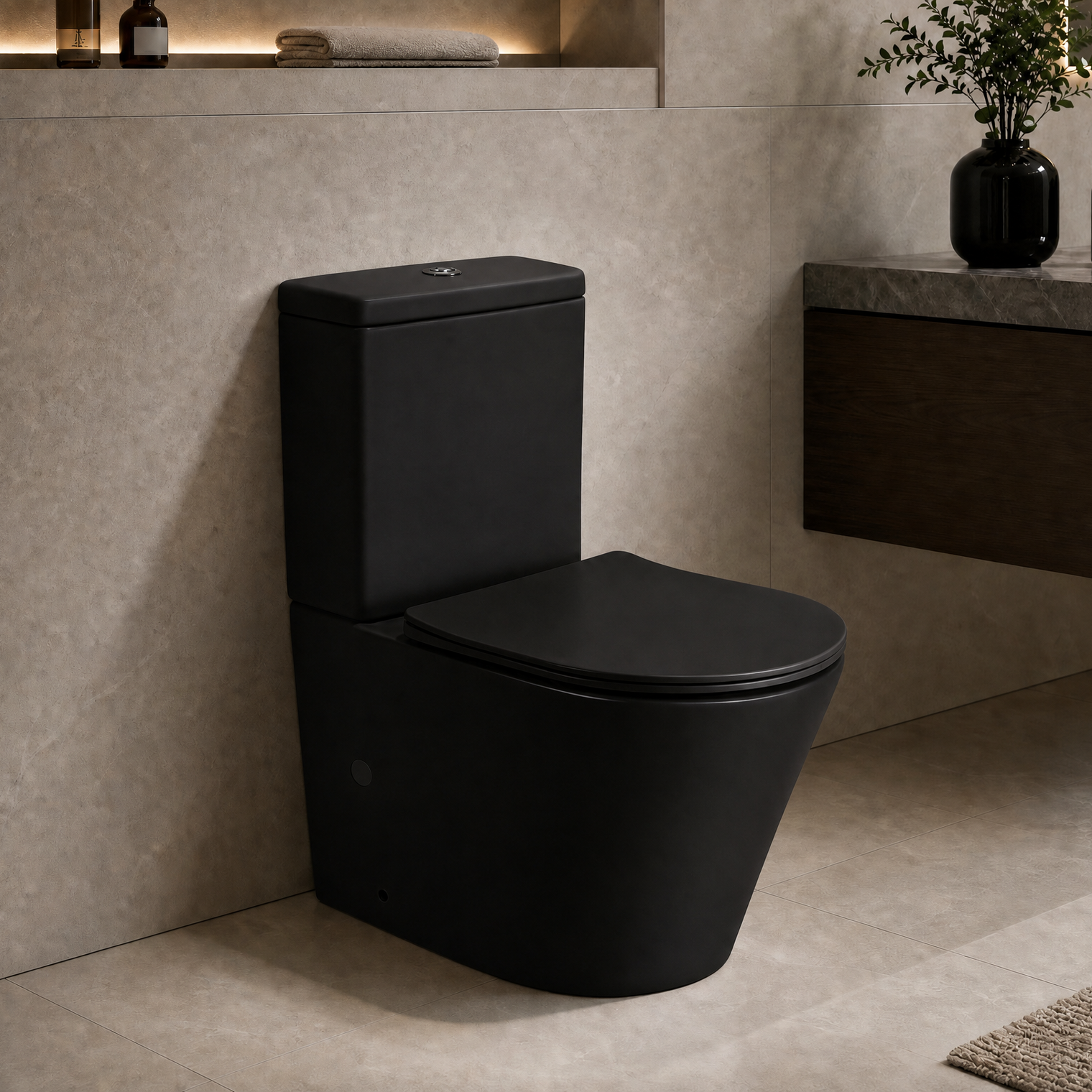 A matte black 2-piece toilet with a matching closed lid, shown installed in a modern bathroom with beige stone walls and a floating dark wood vanity.