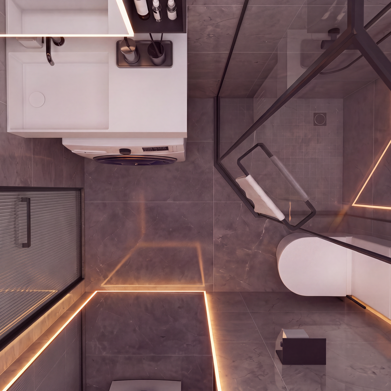 Modern bathroom interior with gray stone-look tiles, warm LED strip lighting, a white toilet, a white vanity unit, and a glass shower screen with black framing.