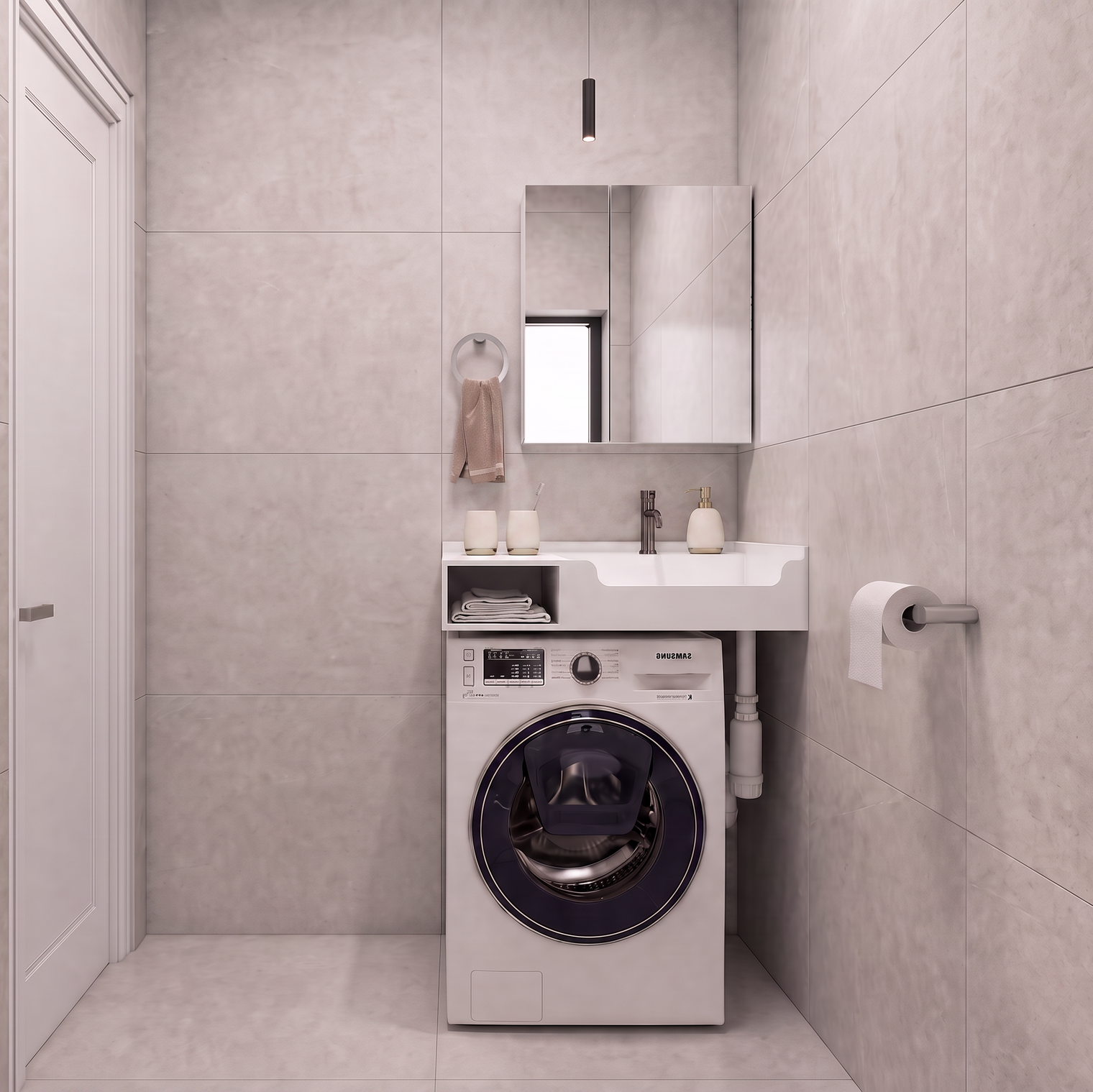 A compact bathroom setup featuring a white front-loading washing machine integrated beneath a matching white sink and mirror, set against light gray tiled walls and floor.