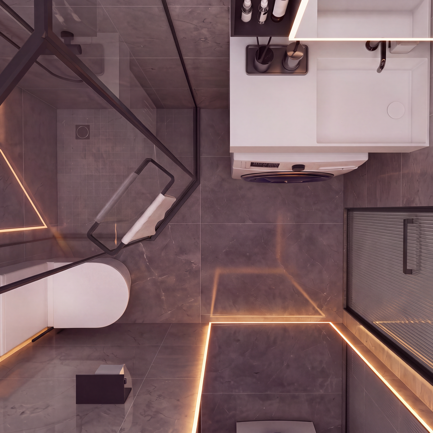 Modern bathroom interior with gray stone-look tiles, warm LED strip lighting, a white toilet, a white vanity unit, and a glass shower screen with black framing.