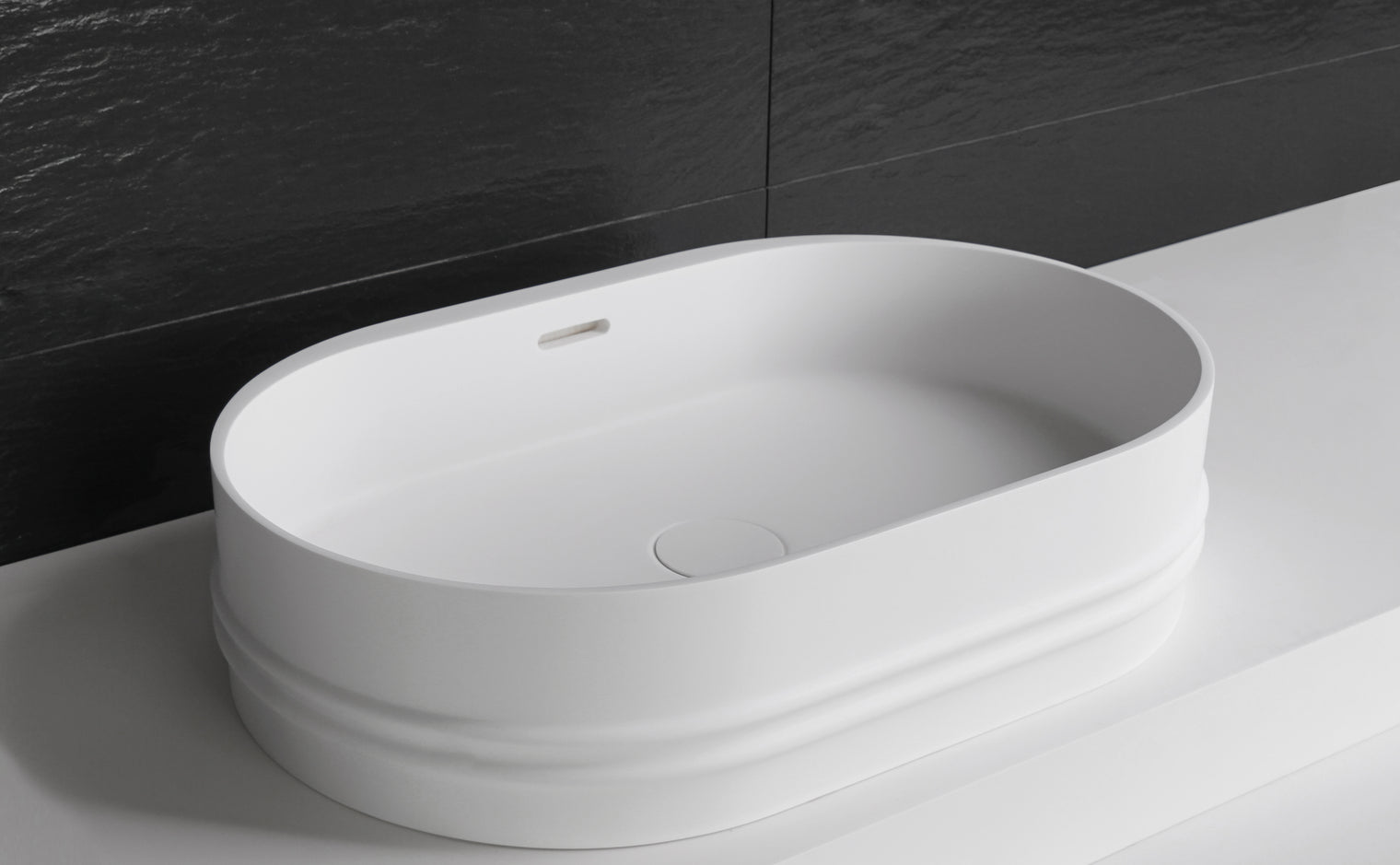 Foggie 55 Designer Solid Surfaces Overcounter Washbasin Foggia系列55CM橢圓型人造石設計師檯上式臉盆採用特別溢水設計